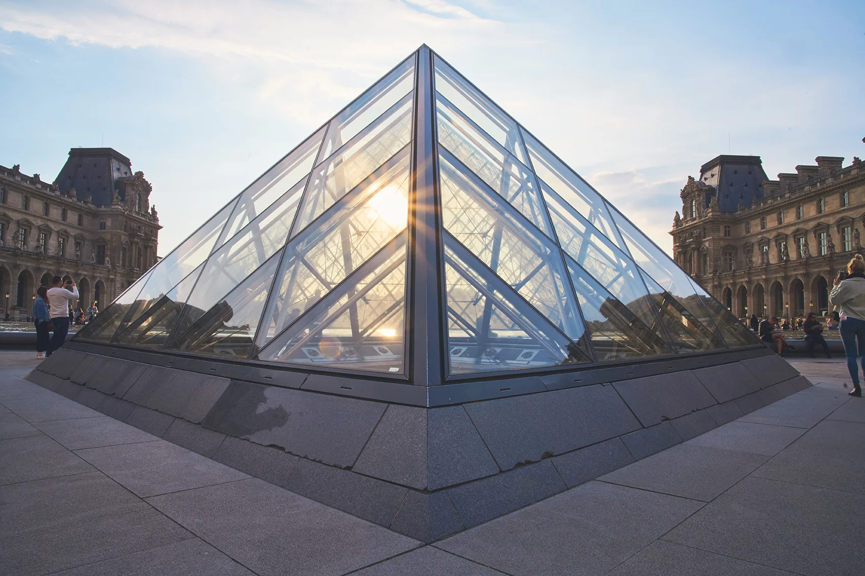 Louvre pyramid at golden hour